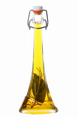 eating olive - Olive oil with rosemary and bay leaf isolated on white background Stock Photo - Budget Royalty-Free & Subscription, Code: 400-05888906