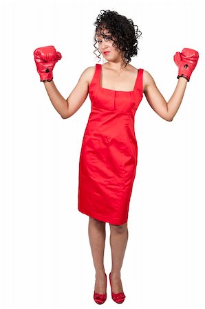 A beautiful young woman wearing a pair of boxing gloves Stock Photo - Budget Royalty-Free & Subscription, Code: 400-05889001