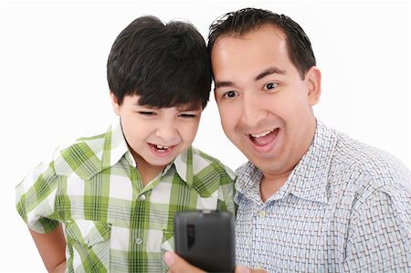 Young father and son was surprised, having read on mobile phone Stock Photo - Budget Royalty-Free & Subscription, Code: 400-05889071