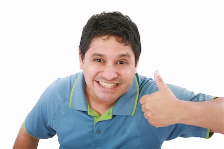 smiling young man with thumbs up on an isolated white background Photographie de stock - Aubaine LD & Abonnement, Code: 400-05889102
