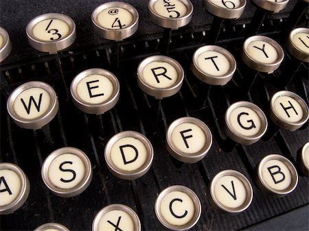 Close up of keys on a dirty old nicotine stained typewriter. Stock Photo - Budget Royalty-Free & Subscription, Code: 400-05889393