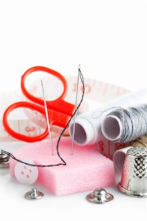 stitching tools - tools for needlework thread scissors and tape measure isolated on white background Stock Photo - Budget Royalty-Free & Subscription, Code: 400-05889474