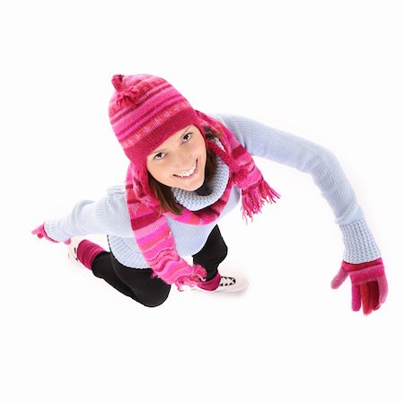 simsearch:400-04319654,k - A picture of a young happy woman skating over white background Stockbilder - Microstock & Abonnement, Bildnummer: 400-05889475