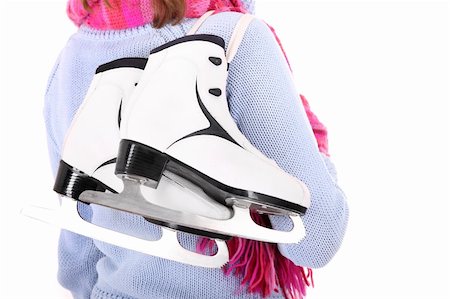 skating ice background - A picture of a pair of figure skates on the back of the woman Stock Photo - Budget Royalty-Free & Subscription, Code: 400-05889479