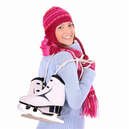 skating ice background - A picture of a young happy woman with her skates over white background Stock Photo - Budget Royalty-Free & Subscription, Code: 400-05889484