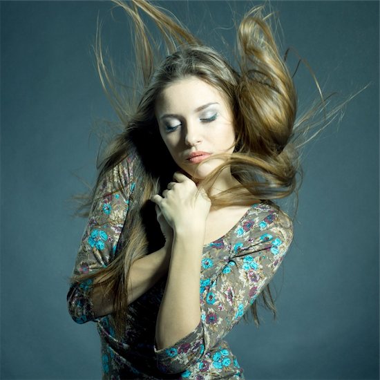 Fashion portrait of beautiful woman with streaming hair and closed eyes wearing bright jacket Foto de stock - Sin royalties, Artista: stolbik84, Código de la imagen: 400-05880096