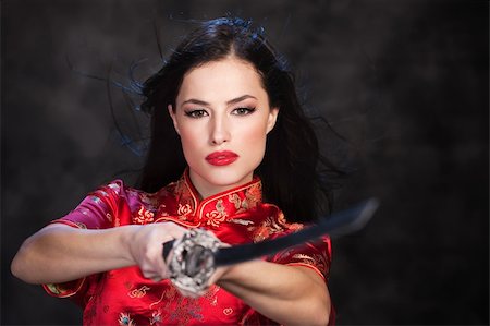 pirate dead - Pretty kimono woman in action with katana/sword Stock Photo - Budget Royalty-Free & Subscription, Code: 400-05880188