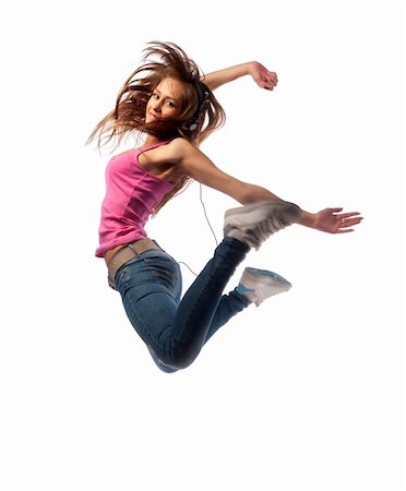 girl in headphones jumps over the floor of happiness Photographie de stock - Aubaine LD & Abonnement, Code: 400-05880243