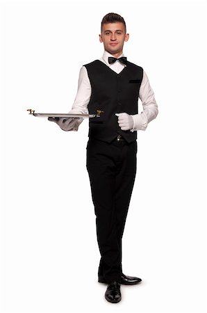 person and cut out and waiter - A young boy waiter with a tray. Isolated background and clipping path Stock Photo - Budget Royalty-Free & Subscription, Code: 400-05880255