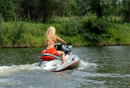 finger lakes - beautiful woman in a bathing suit is riding on a boat on the lake Stock Photo - Budget Royalty-Free & Subscription, Code: 400-05880264