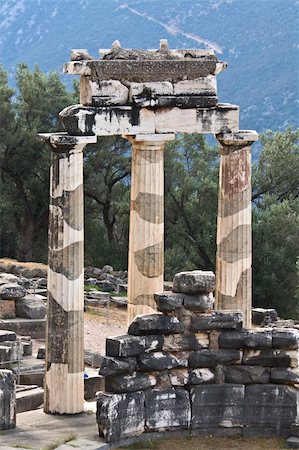 Temple of Athena pronoia at Delphi oracle archaeological site in Greece Stock Photo - Budget Royalty-Free & Subscription, Code: 400-05880380