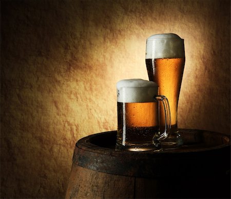 Still Life of beer and barrel on a grange background Stock Photo - Budget Royalty-Free & Subscription, Code: 400-05880404