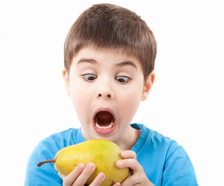 simsearch:673-02138312,k - Image of a child eating a pear Stockbilder - Microstock & Abonnement, Bildnummer: 400-05880718