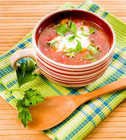 simsearch:400-07298426,k - tomato soup with tomatoes in background ower white Stock Photo - Budget Royalty-Free & Subscription, Code: 400-05881089