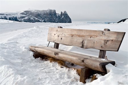 simsearch:400-03924645,k - Isolated wooden bench on snow scape in dolomiti, Alps Stock Photo - Budget Royalty-Free & Subscription, Code: 400-05881328