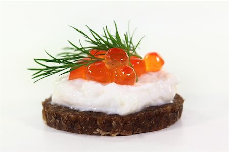 silencefoto (artist) - Pumpernickel with dill and caviar on a white background Stockbilder - Microstock & Abonnement, Bildnummer: 400-05881426