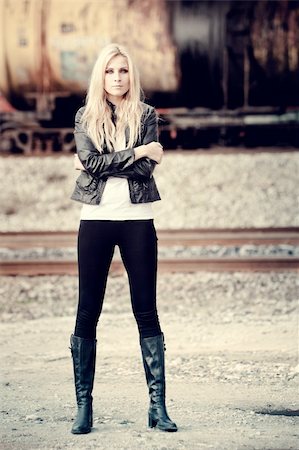 railroad tank - Young woman standing near a train Stock Photo - Budget Royalty-Free & Subscription, Code: 400-05881459