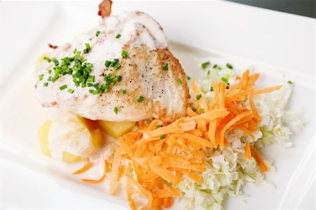 Chicken Stuffed with cream cheese, tomato, carrot and cabbage salad Stock Photo - Budget Royalty-Free & Subscription, Code: 400-05881466