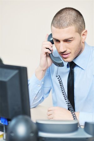 simsearch:400-06108986,k - businessman with a headset portrait at bright call center helpdesk support office Stock Photo - Budget Royalty-Free & Subscription, Code: 400-05881506