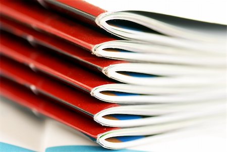 edition - stack of same magazines with red covers closeup Stock Photo - Budget Royalty-Free & Subscription, Code: 400-05882107