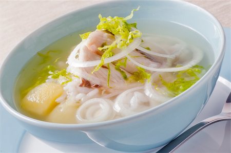 Fish Soup wiht white fish, onion, potato and rise. Fotografie stock - Microstock e Abbonamento, Codice: 400-05882353