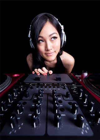 deejay (female) - Wide angle shot of a female DJ using the crossfader. Stock Photo - Budget Royalty-Free & Subscription, Code: 400-05882619