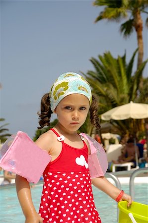 simsearch:400-04608975,k - Portrait of a child playing by the pool Stockbilder - Microstock & Abonnement, Bildnummer: 400-05882816