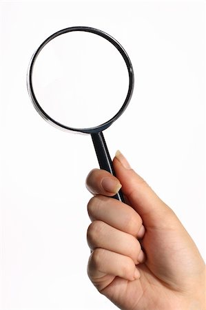 research magnifier hand take in fingers Foto de stock - Royalty-Free Super Valor e Assinatura, Número: 400-05882902