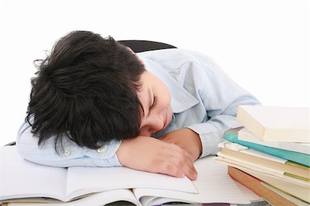 simsearch:400-08429355,k - adorable boy tired to study a over white background Photographie de stock - Aubaine LD & Abonnement, Code: 400-05883259