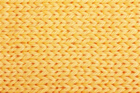 stitches - Macro view of yellow knitting. Horizontal orientation Stock Photo - Budget Royalty-Free & Subscription, Code: 400-05883352