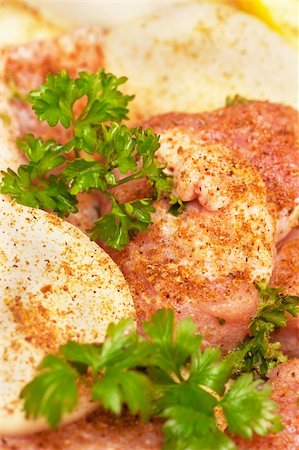 prime rib - Closeup view of spiced uncooked meat with fresh parsley Stock Photo - Budget Royalty-Free & Subscription, Code: 400-05883403