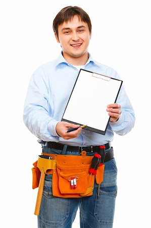 Construction worker giving clipboard and pen for signing Stock Photo - Budget Royalty-Free & Subscription, Code: 400-05883695
