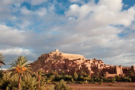 Ait Benhaddou  is a fortified city, or ksar, along the former caravan route between the Sahara and Marrakech in present-day Morocco. Stock Photo - Budget Royalty-Free & Subscription, Code: 400-05883867