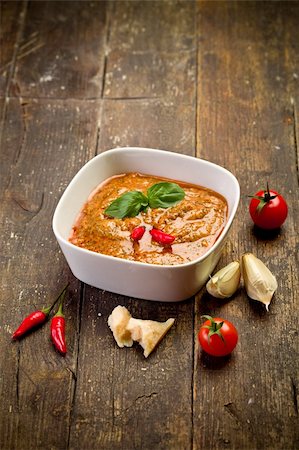 homemade sicilian pesto sauce with chili on wooden table Stockbilder - Microstock & Abonnement, Bildnummer: 400-05894505