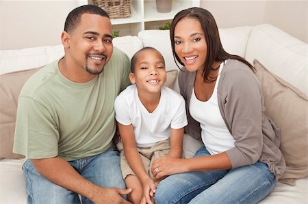 dental mother - A happy African American man, woman and boy, father, mother and son, family sitting together at home Stock Photo - Budget Royalty-Free & Subscription, Code: 400-05894532