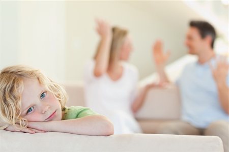 simsearch:400-08899268,k - Sad boy with his fighting parents in the background Stockbilder - Microstock & Abonnement, Bildnummer: 400-05894878