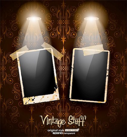 simsearch:400-04205617,k - Antique distressed photoframes with old dirty look on a vintage seamless wallpaper. Frames are featured by led spotlights.Shadows are transparent. Stockbilder - Microstock & Abonnement, Bildnummer: 400-05894918