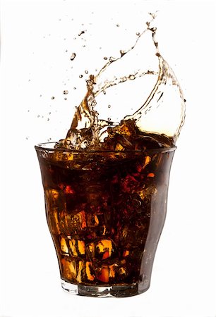 drink flowing - food series: cold cola with ice splash Stock Photo - Budget Royalty-Free & Subscription, Code: 400-05895285
