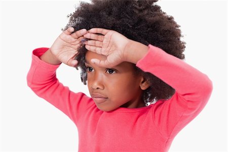 simsearch:400-06885115,k - Girl with her hands on her forehead against a white background Photographie de stock - Aubaine LD & Abonnement, Code: 400-05895680