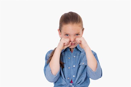 panic - Lonely girl crying against a white background Stock Photo - Budget Royalty-Free & Subscription, Code: 400-05895711