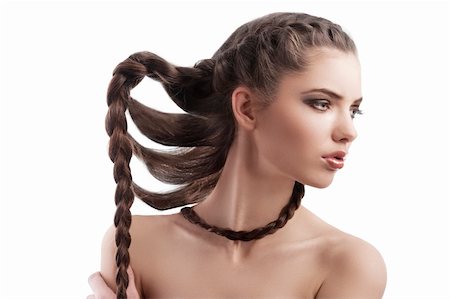 beauty profile shot of a beautiful brunette with long braided hair on white Foto de stock - Super Valor sin royalties y Suscripción, Código: 400-05896019