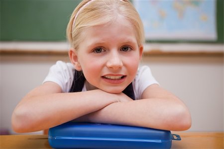 simsearch:400-06744675,k - Girl leaning on her desk in a classroom Stock Photo - Budget Royalty-Free & Subscription, Code: 400-05896339
