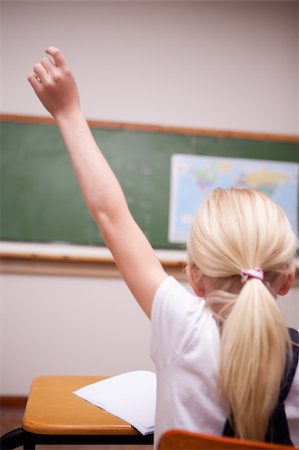 simsearch:400-08937370,k - back view of a schoolgirl raising her hand in a classroom Stock Photo - Budget Royalty-Free & Subscription, Code: 400-05896357