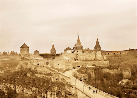 Kamyanets-Podilsky Castle - is a former Ruthenian-Lithuanian  castle located in the historic city of Kamianets-Podilskyi, Ukraine. The castle and its surrounding complex is one of the Seven Wonders of Ukraine. Stock Photo - Budget Royalty-Free & Subscription, Code: 400-05896442