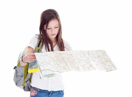 Young girl looking at the map over white background Stock Photo - Budget Royalty-Free & Subscription, Code: 400-05896737