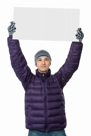 simsearch:400-05368656,k - man in man winter clothes holding a big blank card Stockbilder - Microstock & Abonnement, Bildnummer: 400-05897187