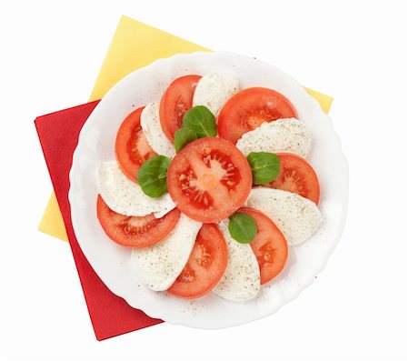 simsearch:400-05337090,k - Feta salad with tomatoes isolated on white Foto de stock - Royalty-Free Super Valor e Assinatura, Número: 400-05897188