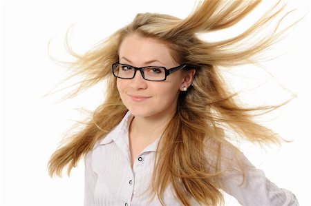 Girl with hair fluttering in the wind Stock Photo - Budget Royalty-Free & Subscription, Code: 400-05897230