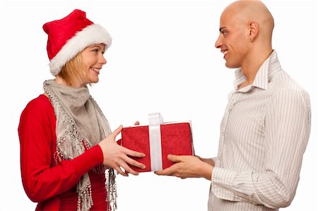 Christmas gift - Girl in santa dress giving a gift to a man Stock Photo - Budget Royalty-Free & Subscription, Code: 400-05897398