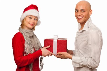 Christmas gift - Girl in santa dress giving a gift to a man Stock Photo - Budget Royalty-Free & Subscription, Code: 400-05897399